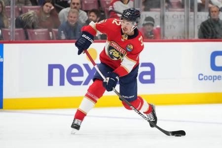 Oct 19, 2022; Sunrise, Florida, USA; Florida Panthers defenseman Lucas Carlsson (32) shoots the puck against the Philadelphia Flyers during the second period at FLA Live Arena.