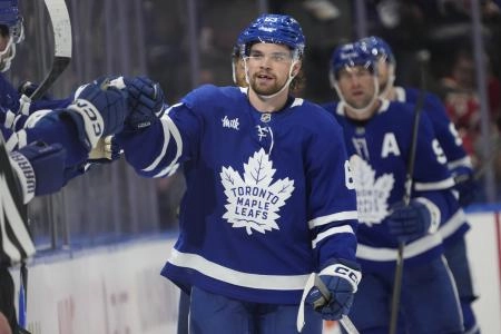 Oct 21, 2025; Toronto, Ontario, CAN; Toronto Maple Leafs forward Matias Maccelli (63) is congratulated after scoring a goal against the Toronto Maple Leafs during the second period at Scotiabank Arena. Mandatory Credit: John E. Sokolowski-Imagn Images Oct 21, 2025; Toronto, Ontario, CAN; Toronto Maple Leafs forward Matias Maccelli (63) is congratulated after scoring a goal against the Toronto Maple Leafs during the second period at Scotiabank Arena. Mandatory Credit: John E. Sokolowski-Imagn Images