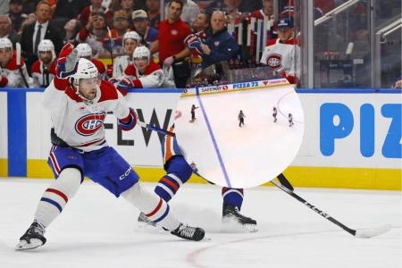 Oct 23, 2025; Edmonton, Alberta, CAN; Edmonton Oilers forward Connor McDavid (97) strips the puck from Montreal Canadiens forward Josh Anderson (17) during the second period at Rogers Place. Mandatory Credit: Perry Nelson-Imagn Images