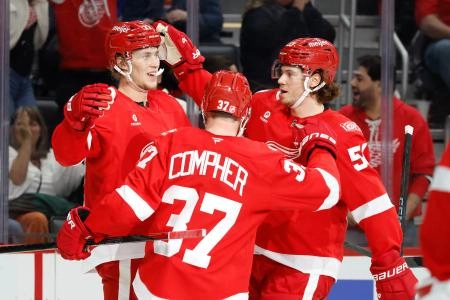 Oct 25, 2025; Detroit, Michigan, USA; Detroit Red Wings defenseman Simon Edvinsson (77) receives congratulations from teammates after scoring in the third period against the St. Louis Blues at Little Caesars Arena. Mandatory Credit: Rick Osentoski-Imagn Images Oct 25, 2025; Detroit, Michigan, USA; Detroit Red Wings defenseman Simon Edvinsson (77) receives congratulations from teammates after scoring in the third period against the St. Louis Blues at Little Caesars Arena. Mandatory Credit: Rick Osentoski-Imagn Images