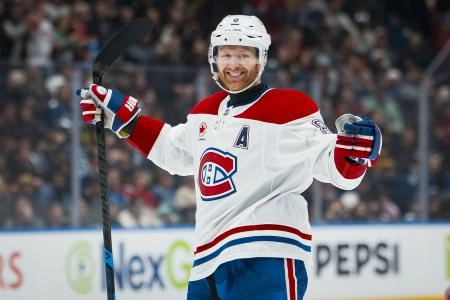 Oct 25, 2025; Vancouver, British Columbia, CAN; Montreal Canadiens defenseman Mike Matheson (8) celebrates his goal against the Vancouver Canucks in the third period at Rogers Arena. Mandatory Credit: Bob Frid-Imagn Images