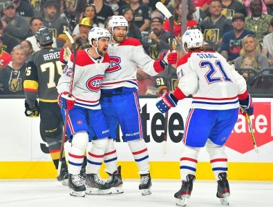 Jun 16, 2021; Las Vegas, Nevada, USA; Montreal Canadiens right wing Joel Armia (40) celebrates with Montreal Canadiens defenseman Erik Gustafsson (32) and Montreal Canadiens center Eric Staal (21) after scoring a first period goal against the Vegas Golden Knights in game two of the 2021 Stanley Cup Semifinals at T-Mobile Arena. Mandatory Credit: Stephen R. Sylvanie-Imagn Images