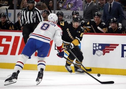 Feb 22, 2024; Pittsburgh, Pennsylvania, USA; Pittsburgh Penguins center Sidney Crosby (87) moves the puck against Montreal Canadiens defenseman Mike Matheson (8) during the first period at PPG Paints Arena. Mandatory Credit: Charles LeClaire-Imagn Images Feb 22, 2024; Pittsburgh, Pennsylvania, USA; Pittsburgh Penguins center Sidney Crosby (87) moves the puck against Montreal Canadiens defenseman Mike Matheson (8) during the first period at PPG Paints Arena. Mandatory Credit: Charles LeClaire-Imagn Images