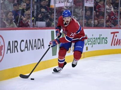 Oct 20, 2025; Montreal, Quebec, CAN; Montreal Canadiens defenseman Arber Xhekaj (72) plays the puck during the second period of the game against the Buffalo Sabres at the Bell Centre. Mandatory Credit: Eric Bolte-Imagn Images