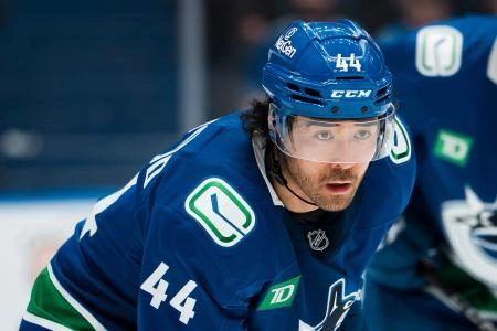 Oct 13, 2025; Vancouver, British Columbia, CAN; Vancouver Canucks forward Kiefer Sherwood (44) during a stop in play against the St. Louis Blues in the third period at Rogers Arena