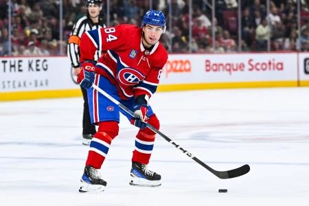 Sep 27, 2023; Montreal, Quebec, CAN; Montreal Canadiens defenseman William Trudeau (84) plays the puck against the Ottawa Senators during the second period at Bell Centre. Mandatory Credit: David Kirouac-Imagn Images