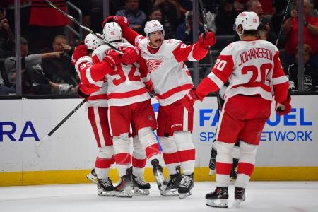 Oct 30, 2025; Los Angeles, California, USA; Detroit Red Wings celebrate the goal scored by center Marco Kasper (92) against the Los Angeles Kings during the third period at Crypto.com Arena. Mandatory Credit: Gary A. Vasquez-Imagn Images Oct 30, 2025; Los Angeles, California, USA; Detroit Red Wings celebrate the goal scored by center Marco Kasper (92) against the Los Angeles Kings during the third period at Crypto.com Arena. Mandatory Credit: Gary A. Vasquez-Imagn Images