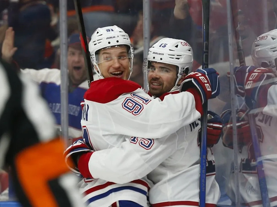  Canadiens’ Oliver Kapanen, left, and Alex Newhook celebrate a goal against the Oilers during the first period in Edmonton on Thursday night.