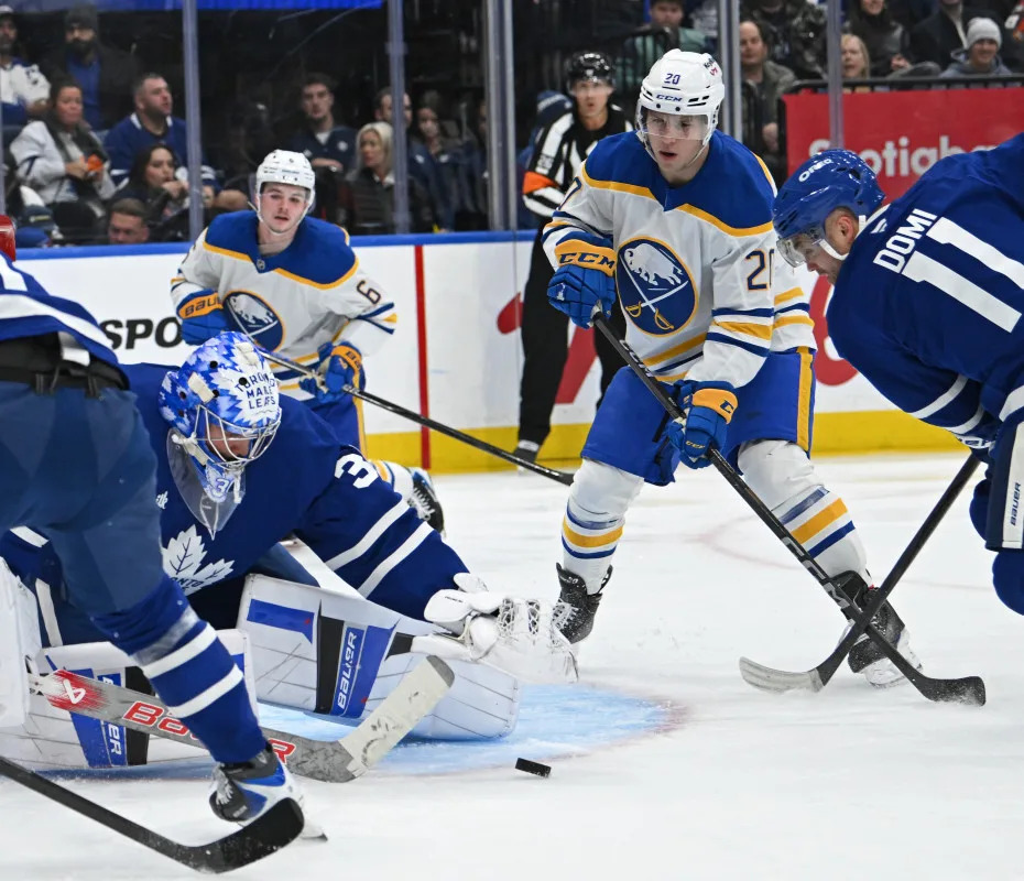 Toronto Maple Leafs goalie Cayden Primeau (30) makes a save against the Buffalo Sabres.qGerry Angus-Imagn Images