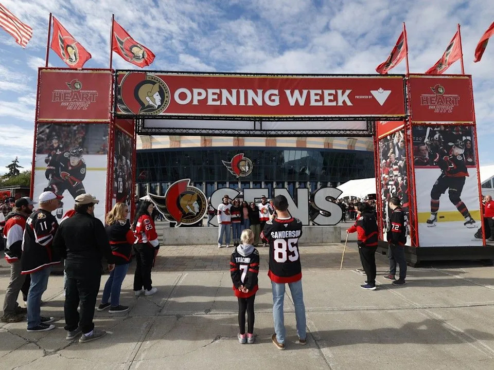  Sens fans enjoying the nice weather outside the Canadian Tire Centre before the home opener Monday.