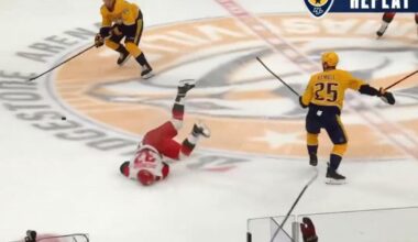 Andrei Svechnikov destroyed by open ice hit at center ice.