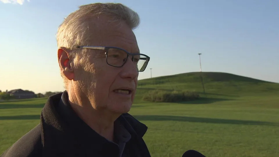 Thom Gross, seen in a Sept. 20, 2025, photo near the Terry Sawchuk Arena in Winnipeg, coached and trained Winnipeg Jets centre Jonathan Toews during his days as a minor hockey player. He said he's not surprised to see his former pupil working to return to the sport's top level.