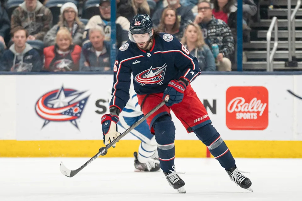 Dec 23, 2023; Columbus, Ohio, USA;
Columbus Blue Jackets right wing Kirill Marchenko (86) places the puck back on the ice during the third period of their game against the Toronto Maple Leafs on Saturday, Dec. 23, 2023 at Nationwide Arena.