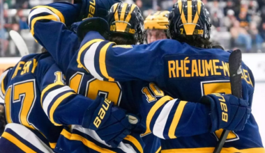 Michigan improves to 4-0; Oxford's Norris suffers setback