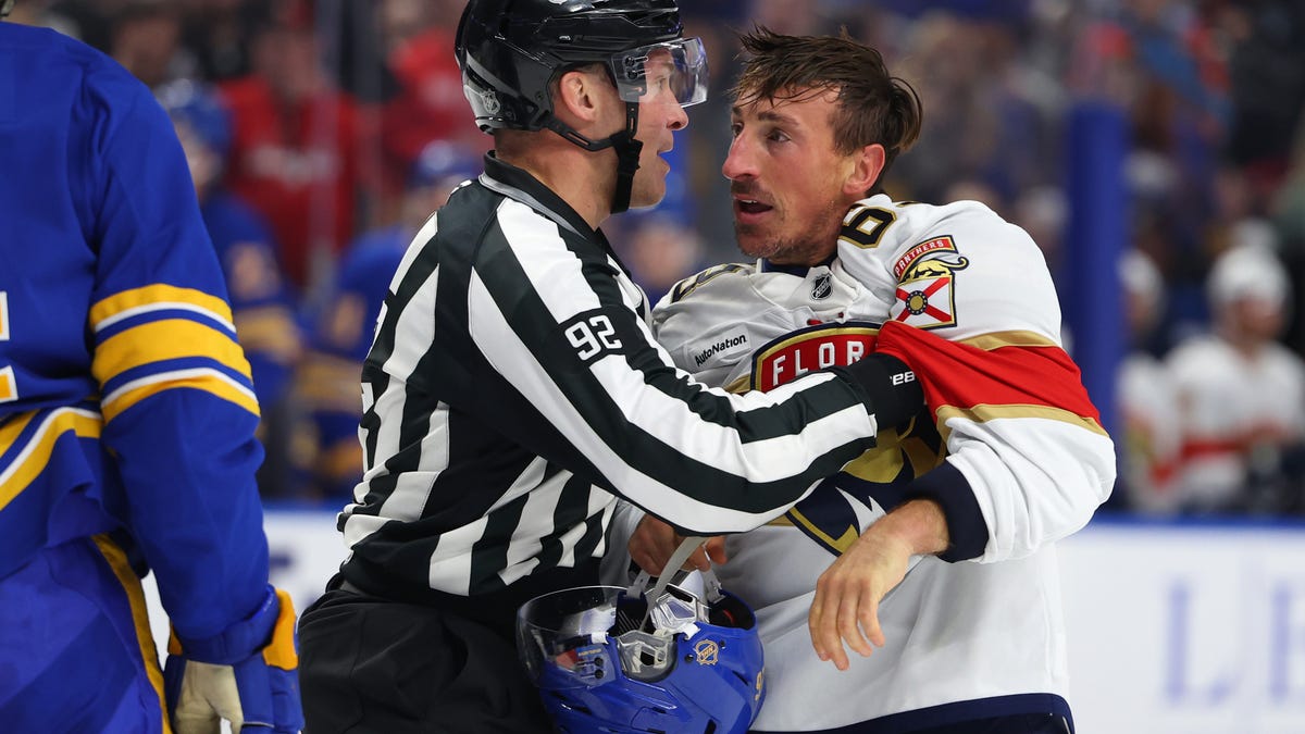 Brad Marchand damages Rasmus Dahlin's helmet in penalty box