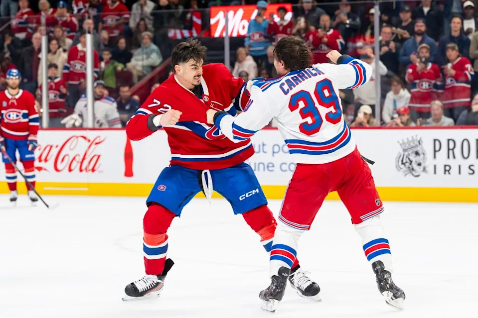 Arber Xhekaj #72 of the Montreal Canadiens fights with Sam Carrick #39 of the New York Rangers during the second period of the NHL regular season game between the Montreal Canadiens and the New York Rangers at the Bell Centre. NHLI via Getty Images