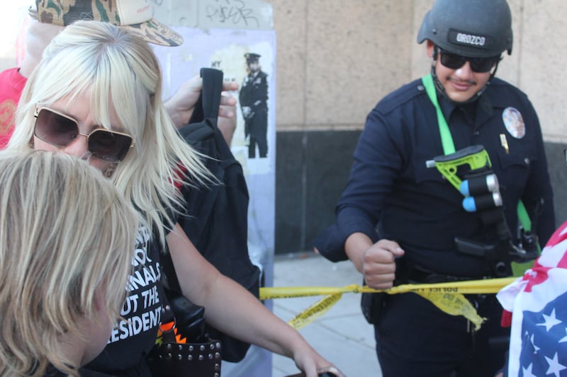 LAPD officer fist bumping child