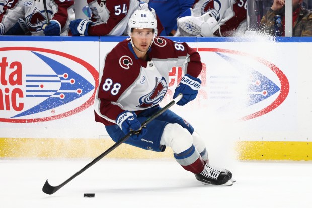 Colorado Avalanche center Martin Necas (88) carries the puck during the second period of an NHL hockey game against the Buffalo Sabres Monday, Oct. 13, 2025, in Buffalo, N.Y. (AP Photo/Jeffrey T. Barnes)