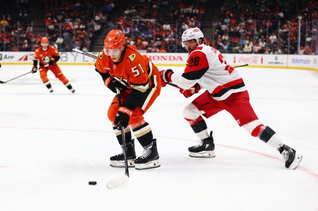 Ducks defenseman Olen Zellweger (51) controls the puck against Carolina...