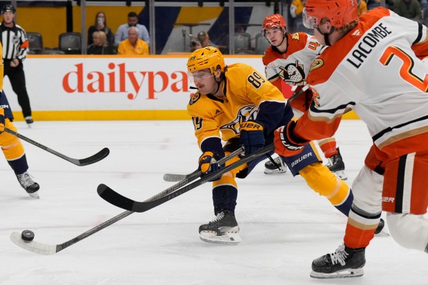 Nashville Predators right wing Ozzy Wiesblatt (89) deflects a shot...