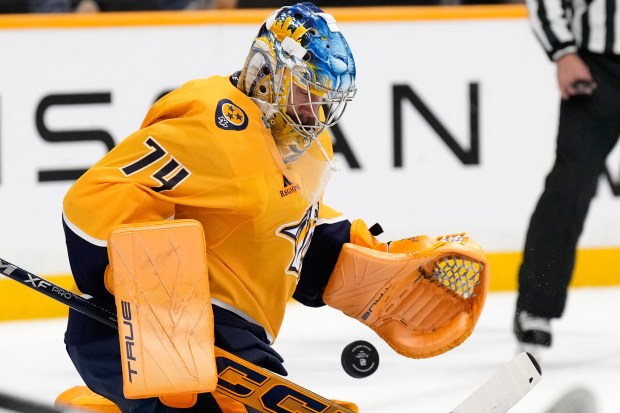 Nashville Predators goaltender Juuse Saros (74) defends the goal during...