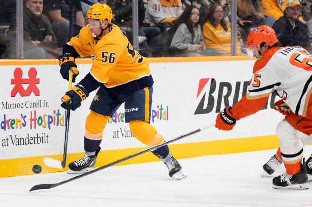Nashville Predators left wing Erik Haula (56) passes the puck...