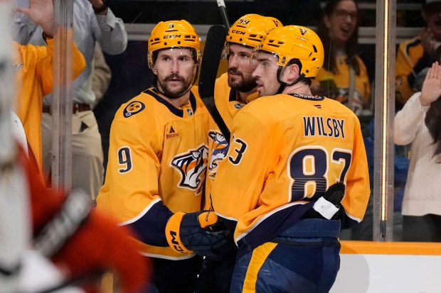 Nashville Predators left wing Filip Forsberg (9) is congratulated after...