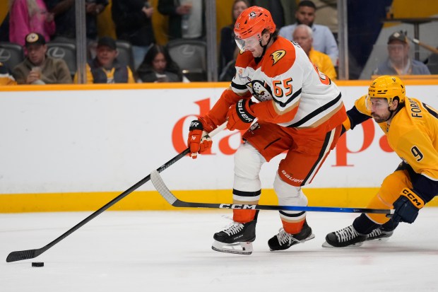 Ducks defenseman Jacob Trouba (65) moves the puck past Nashville...