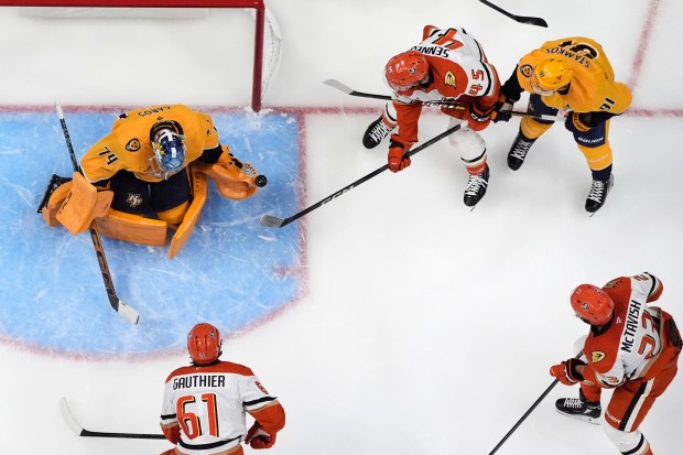 Nashville Predators goaltender Juuse Saros (74) blocks a shot on...