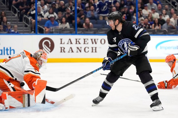 Ducks goaltender Lukas Dostal (1) stops a shot by Tampa...