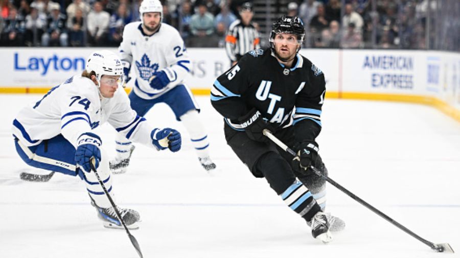 Alexander Kerfoot #15 of the Utah Hockey Club...