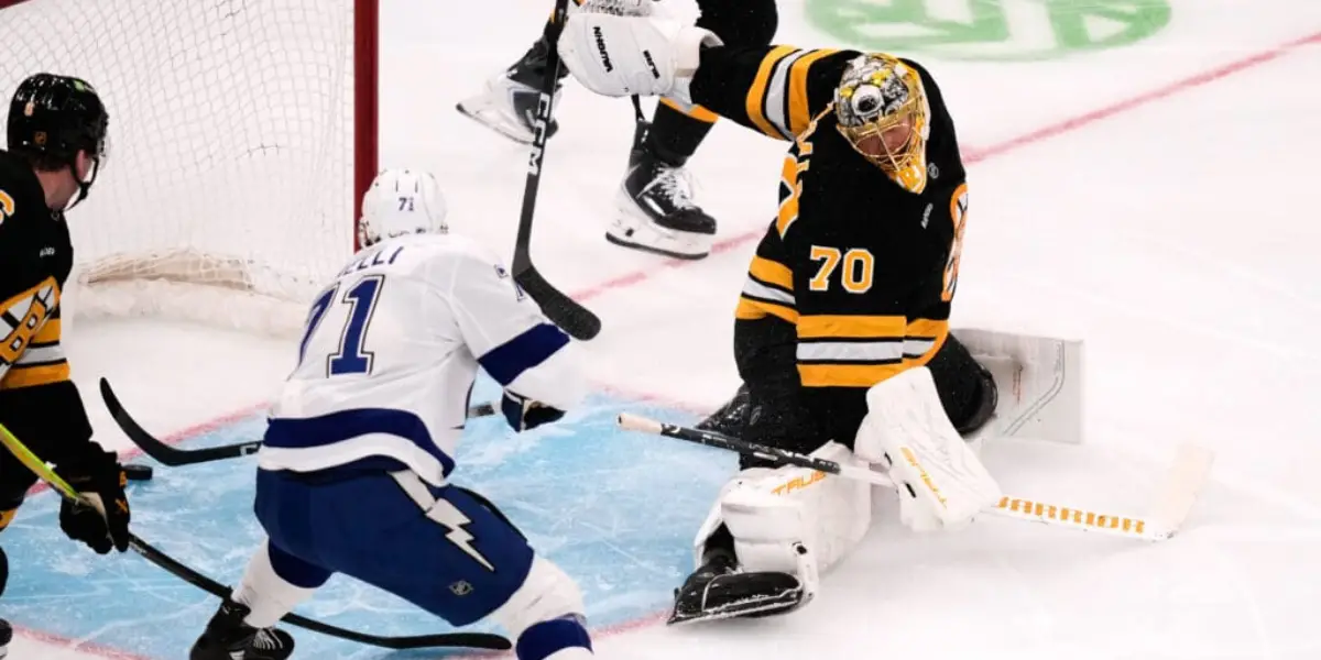 Anthony Cirelli of the Tampa Bay Lightning scoring on Boston Bruins goaltender Joonas Korpisalo 10/13/2025