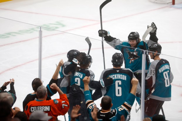 San Jose Sharks' Will Smith (2) celebrates his goal with...