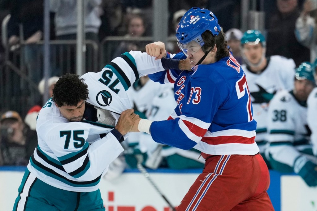 New York Rangers' Matt Rempe fights San Jose Sharks' Ryan Reaves