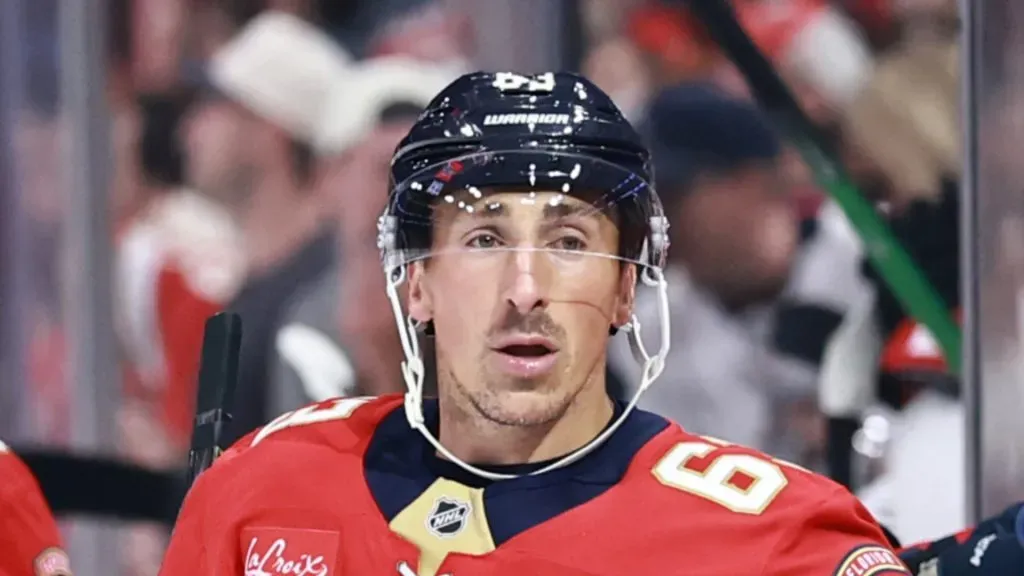 Brad Marchand skates by the bench after a goal