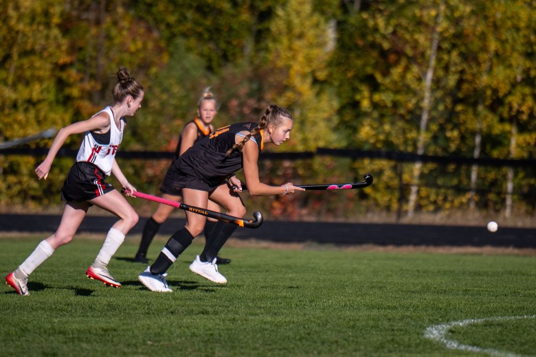 Conant junior captain Brianne Dupuis moves the ball.