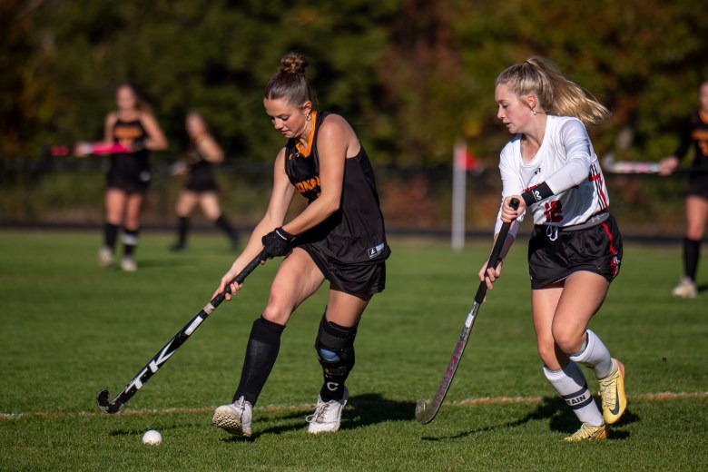 Conant senior captain Sophia Spingola dribbles the ball through the midfield.
