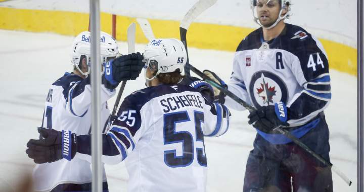 Toews scores his first as Winnipeg Jets come back to beat Flames 2-1 - Winnipeg