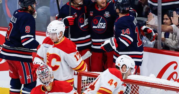 Winnipeg Jets ride four-goal second period to down Flames 5-3 - Winnipeg