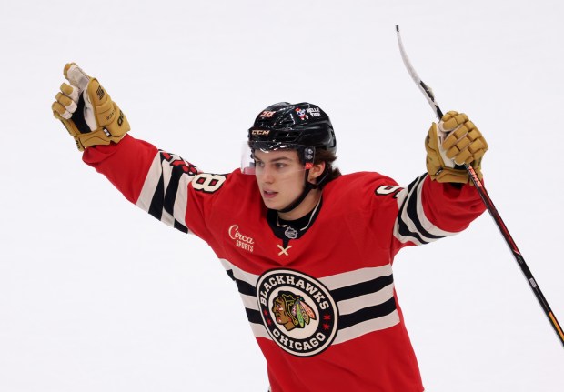 The Blackhawks' Connor Bedard celebrates after scoring the game-winning goal to beat Utah 4-3 in overtime March 7, 2025, at the United Center. (John J. Kim/Chicago Tribune)