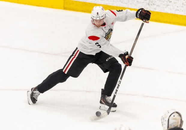 Blackhawks defenseman Sam Rinzel shoots on goal during practice on Sept. 10, 2025, at Fifth Third Arena. (Dominic Di Palermo/ Chicago Tribune)
