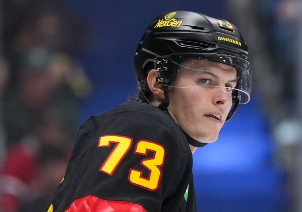 The Canucks' Lukas Reichel waits to take a faceoff against the Canadiens on Oct. 25, 2025, in Vancouver, British Columbia. (Darryl Dyck/The Canadian Press via AP)