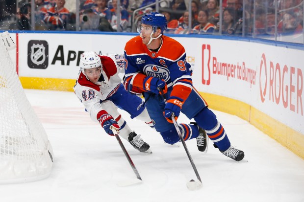 Connor McDavid of the Oilers skates against Lane Hutson of the Canadiens on Oct. 23, 2025, in Edmonton, Alberta. (Codie McLachlan/Getty Images)
