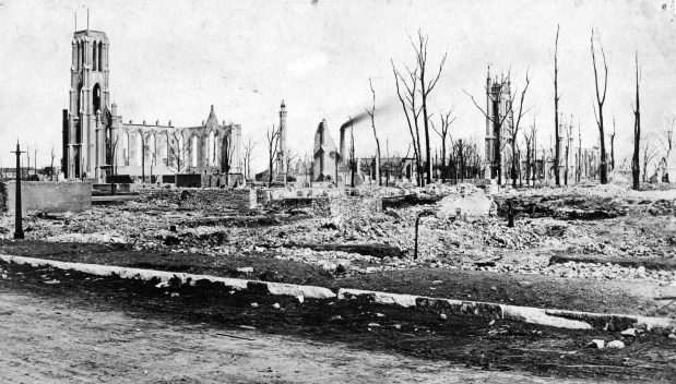 Holy Name Cathedral, left, and St. James Episcopal Church, right, lay in ruins after the Great Chicago Fire in 1871. Between them, in the background, stands the old water tower. (Chicago Tribune archive)