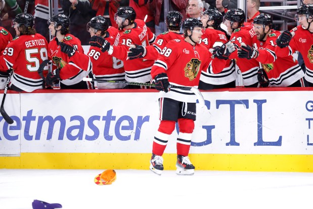Connor Bedard #98 of the Chicago Blackhawks celebrates after scoring his third goal of the game, his first career hat trick, against the Ottawa Senators during the third period at the United Center on Oct. 28, 2025 in Chicago, Illinois. (Photo by Michael Reaves/Getty Images)