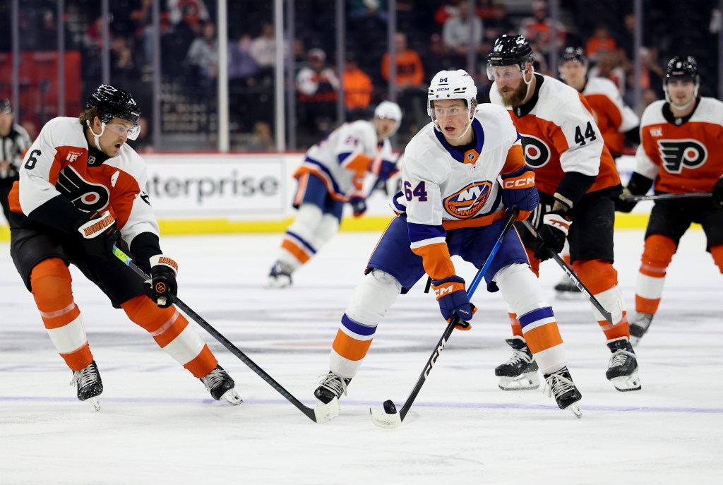 Cal Ritchie, who later exited with a lower body injury, skates with the puck during the Islanders' 4-3 preseason loss to the Flyers on Oct. 2, 2025.