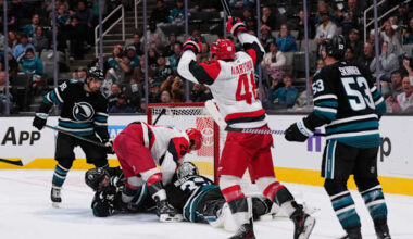 Carrier, Robinson score late in 2nd period and Hurricanes beat Sharks 5-1 to improve to 3-0