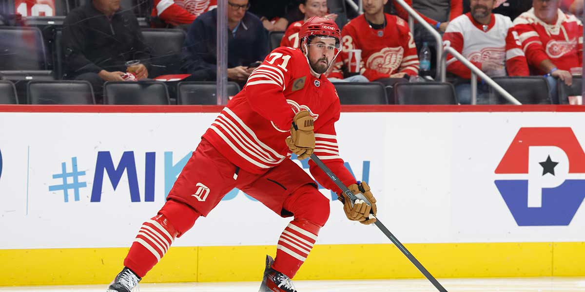 Detroit Red Wings center Dylan Larkin (71) skates with the puck in the first period against the Montréal Canadiens at Little Caesars Arena.