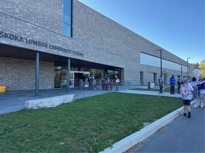Students head into the Muskoka Lumber Community Centre in Bracebridge, Ont. on Wed., Oct. 1, 2025, to watch the Toronto Maple Leafs hold training camp.