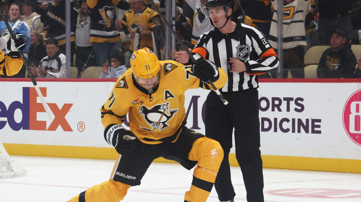 Pittsburgh Penguins center Evgeni Malkin (71) reacts after scoring a goal against the New York Islanders during the first period at PPG Paints Arena.